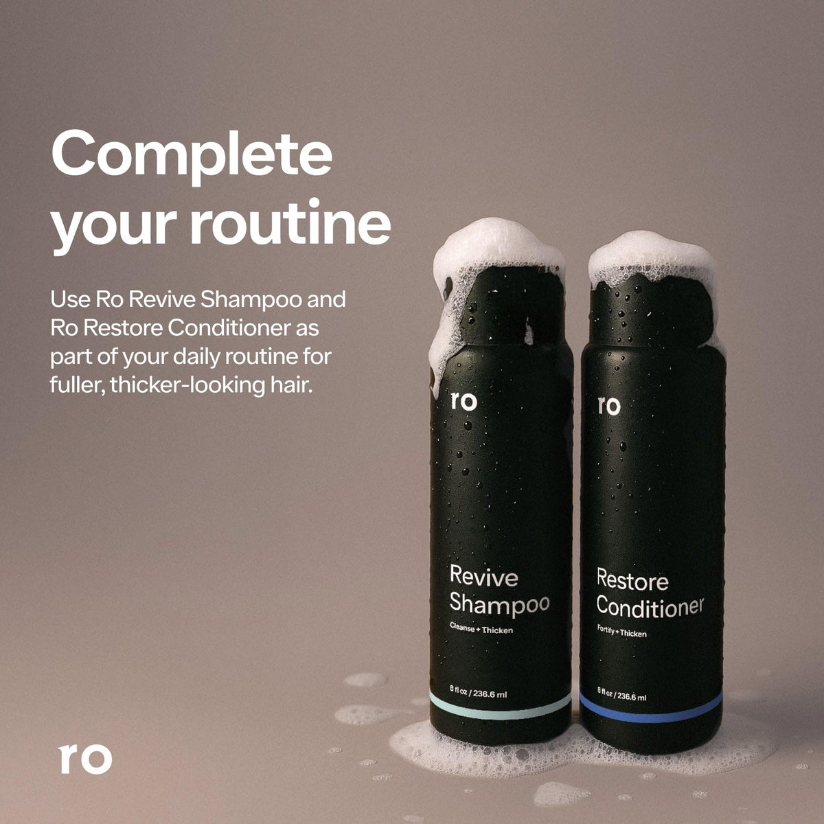 Shampoo lather on hand in shower, Ro demonstrating effective buildup removal benefit