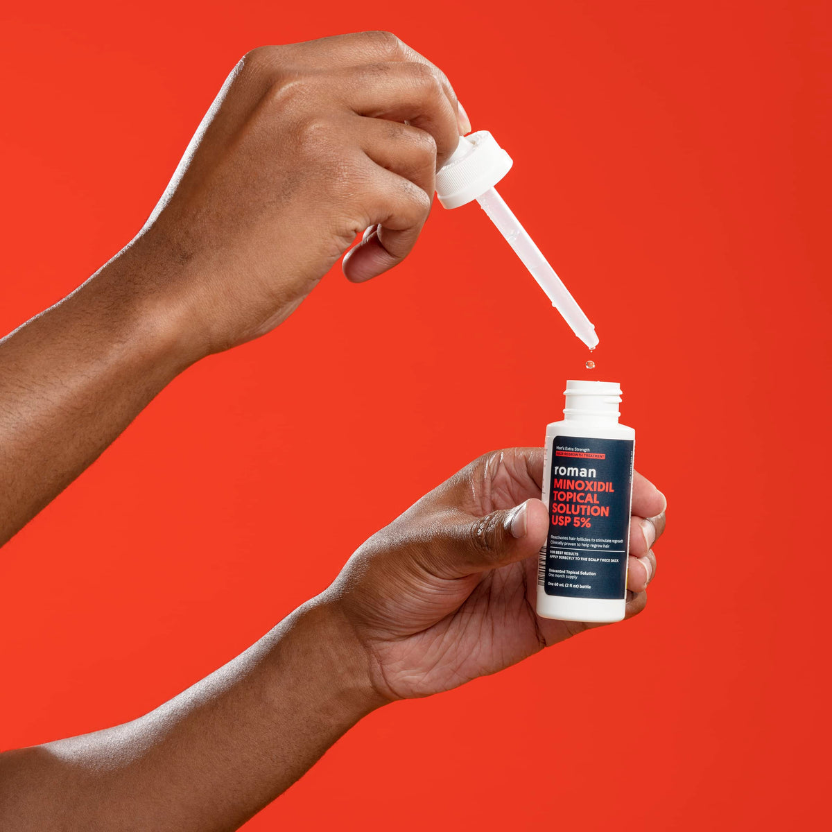 Ro Roman liquid texture on scalp demonstrating easy absorption benefit
