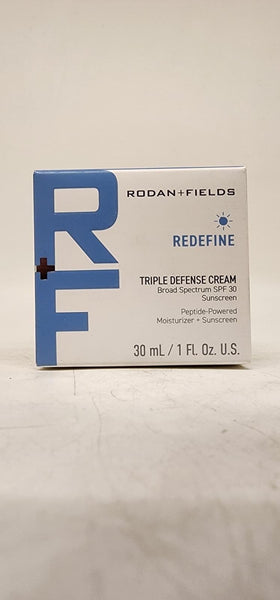 Rodan + Fields cream applied on hand illustrating quick absorption and moisturized look