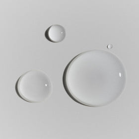 RODAN + FIELDS applying serum under makeup for dewy base and improved wear