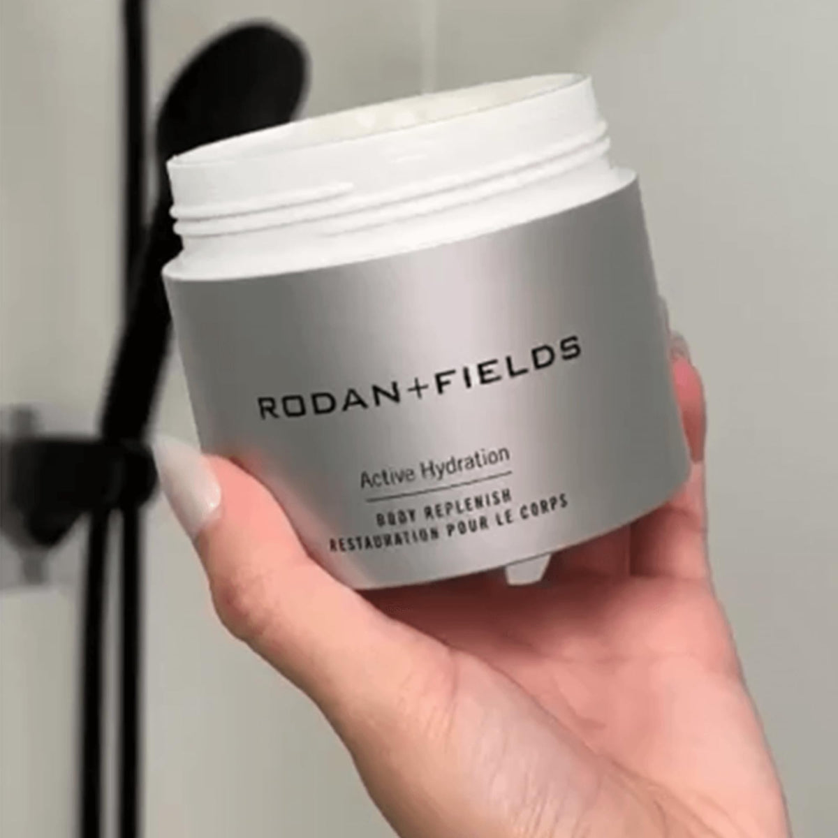 RODAN + FIELDS creamy lotion texture close-up demonstrating fast absorption