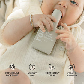 Roe Wellness bottle placed on towel ready for pool day with protective benefit