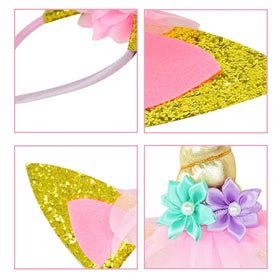 Roffiy detailed shot of fabric flowers on headband, showing color and stitching