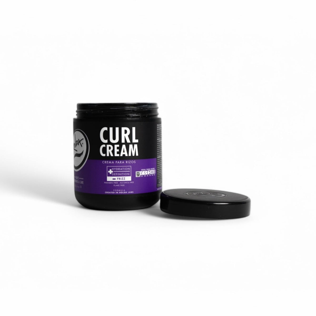 Rolda curl cream next to hand for scale showing the 17.6 oz jar size