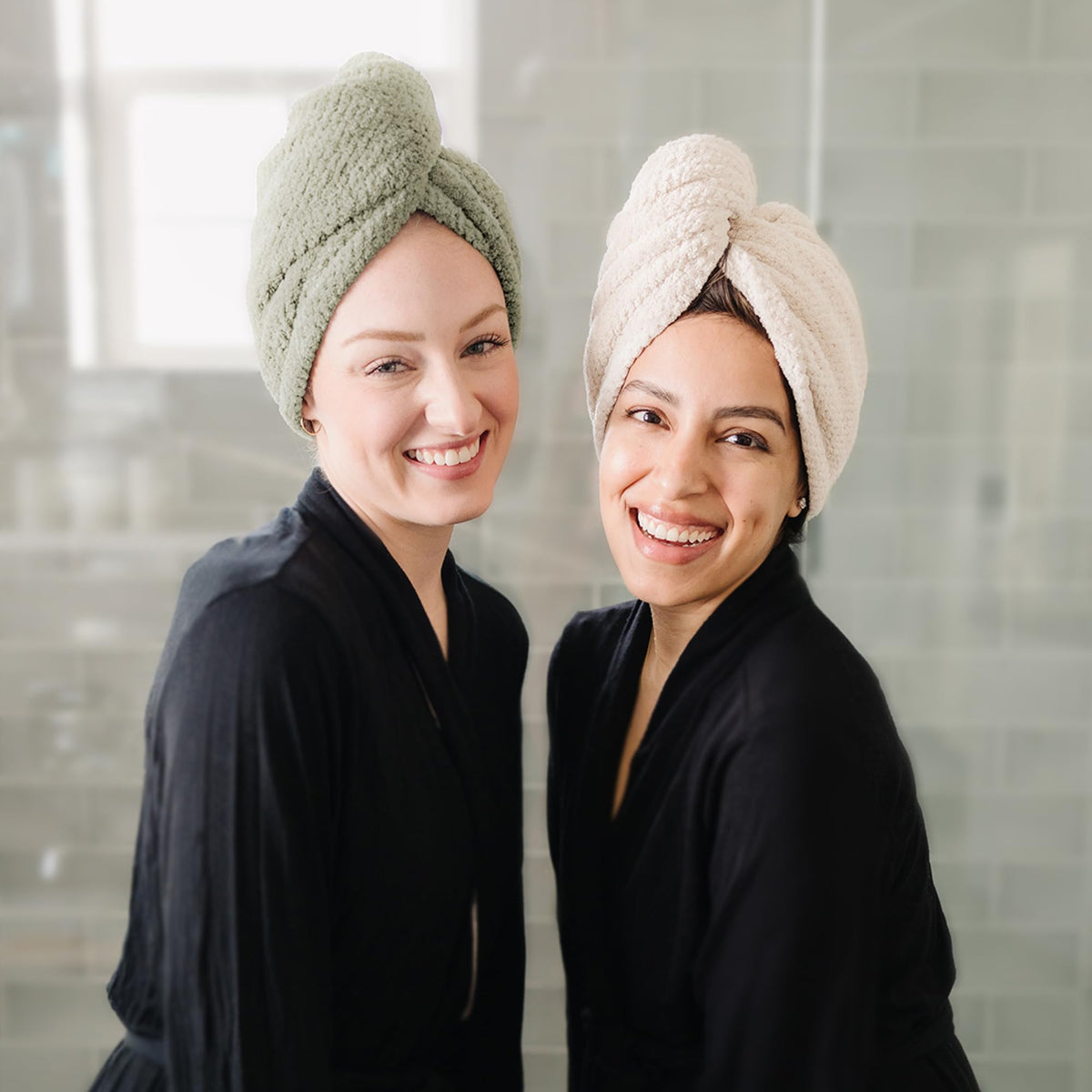 ROLSHOL towel next to hand showing extra-large dimensions for long and thick hair