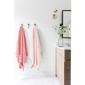 ROLSHOL neatly folded on bathroom shelf showing tidy storage benefit