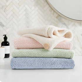 ROLSHOL four colorful wraps displayed on counter showing versatile multi-use benefit