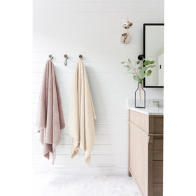ROLSHOL towel on bathroom vanity in use illustrating convenient everyday benefit