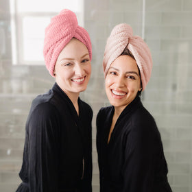 ROLSHOL towel beside hairbrush illustrating extra-large coverage benefit