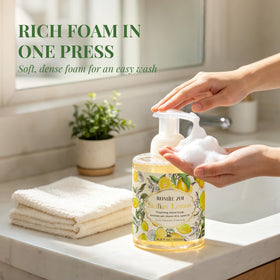 ROMIIE ZOI bottle held in hand to show 500ml size and scale