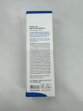 ROUND LAB ampoule placed on vanity with other skincare to show routine use