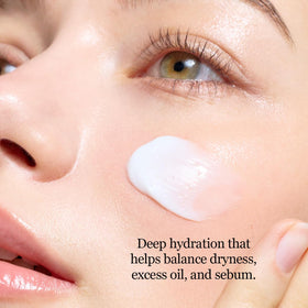 ROUND LAB cream applied to hand showing quick absorption benefit