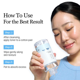 ROUND LAB toner placed with other skincare products to show layering benefit