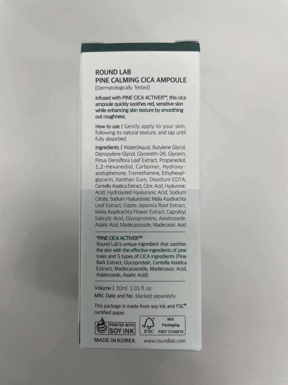 ROUND LAB applying ampoule to face illustrating soothing application and quick absorption