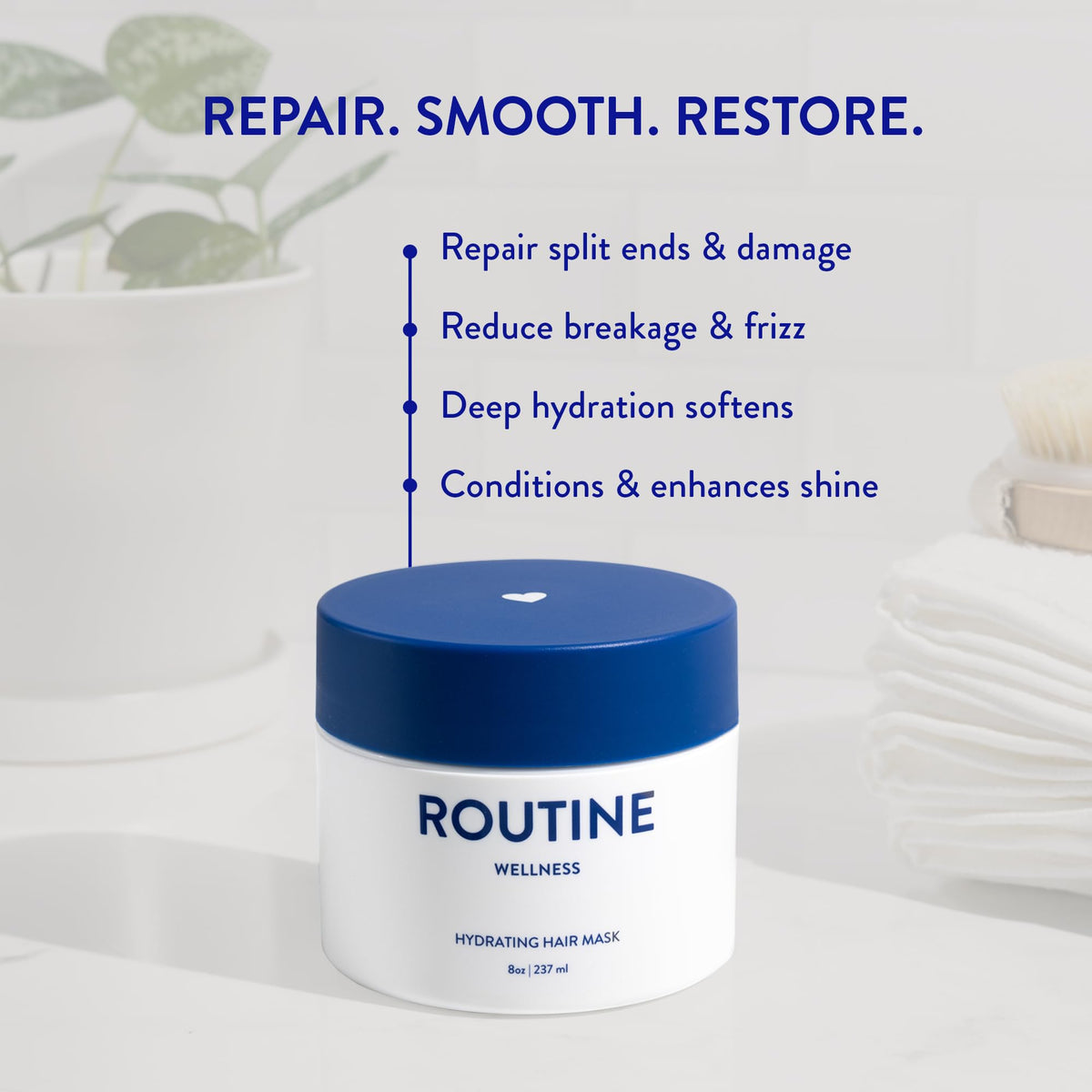 Routine Wellness applying mask to mid-lengths demonstrating repair and detangling