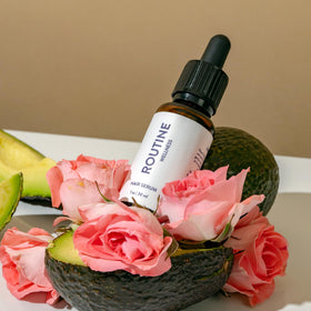 Routine Wellness on bathroom shelf in lifestyle scene suggesting daily routine and shelf-ready design