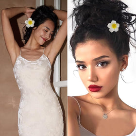 ROYHOO frangipani clip in a beach updo showing tropical style and lightweight comfort