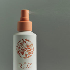 RŌZ fine mist spraying into air showing lightweight coverage benefit
