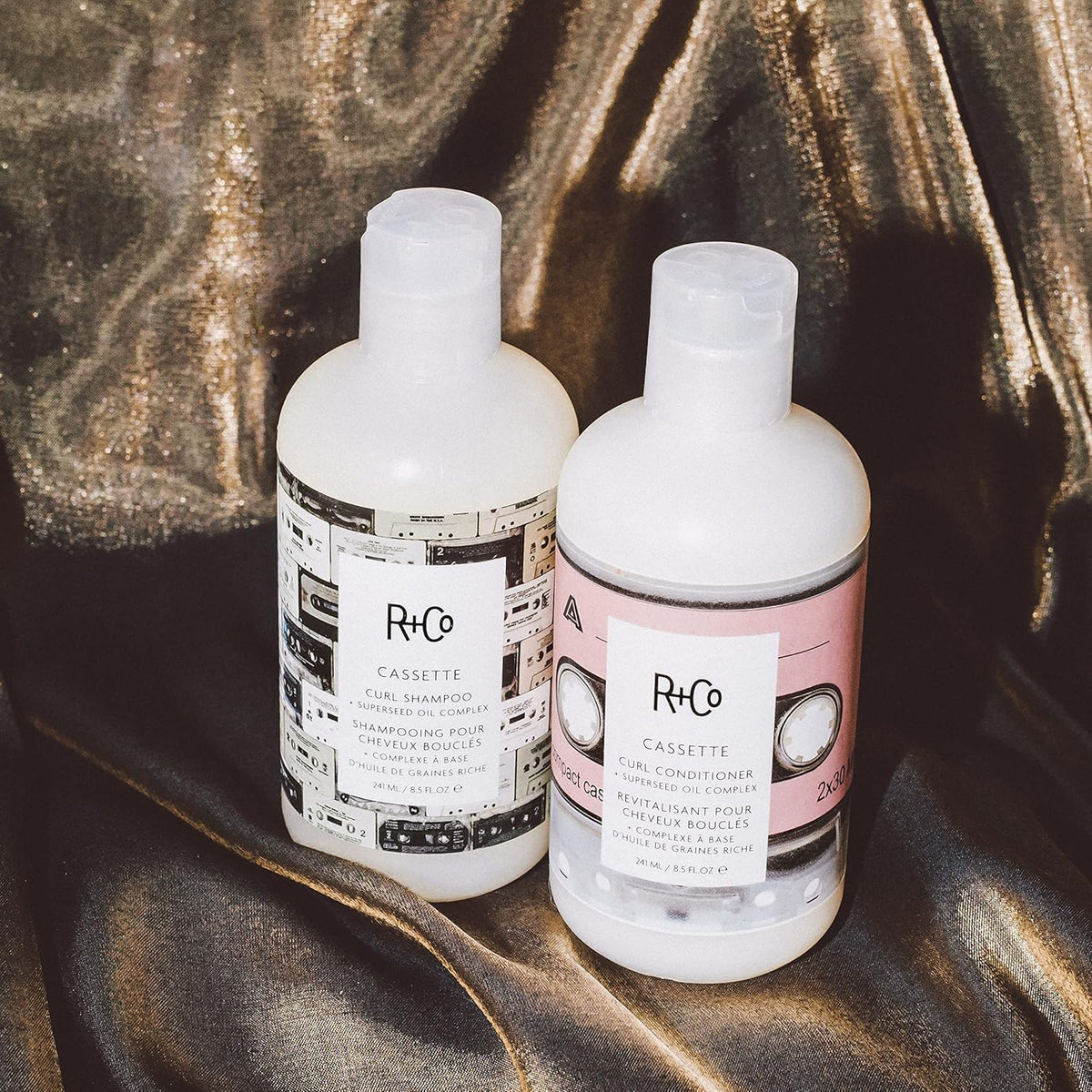 R+Co Cassette creamy lather texture on hand, demonstrating gentle cleansing and slip