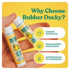 Rubber Ducky lip balm in hand for scale, small travel‑friendly size