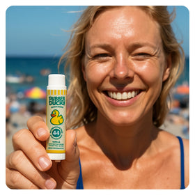 Rubber Ducky ingredient label closeup, lists SPF and vitamin E benefits