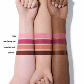 Ruby & Millie on lips showing subtle tint and glossy finish that brightens smile