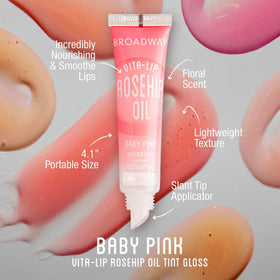 Ruby Kisses open gloss tube close-up highlighting creamy applicator and shine