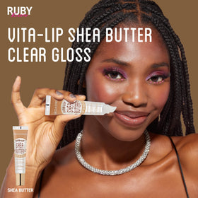 Ruby Kisses gloss on desk in lifestyle scene for quick touch-ups