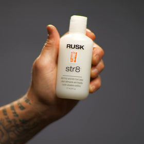 RUSK Str8 applied during blow-dry showing smoother hair and frizz control