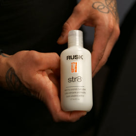 RUSK Str8 lotion texture closeup highlighting lightweight, greaseless feel