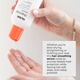 RUSK bottle next to hand demonstrating 4 oz size and travel-friendly benefit
