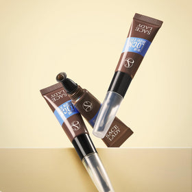 SACE LADY tube beside lipstick showing compact size and portability