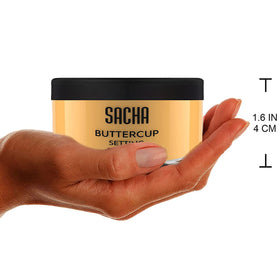 Sacha Cosmetics Buttercup next to coin for scale showing compact 1.75 oz size