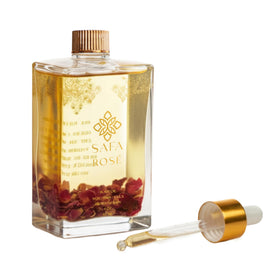 SAFA bottle front view showing elegant rose oil packaging and premium finish