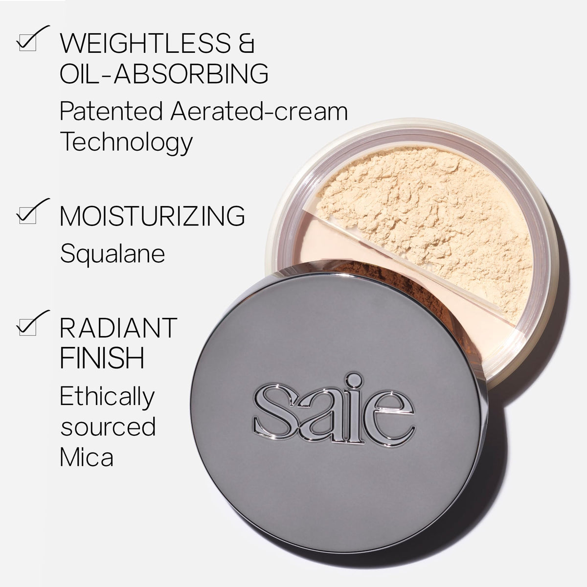 Saie powder swatch on hand showing light coverage and blendability