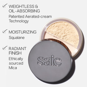 Saie powder swatch on hand showing light coverage and blendability