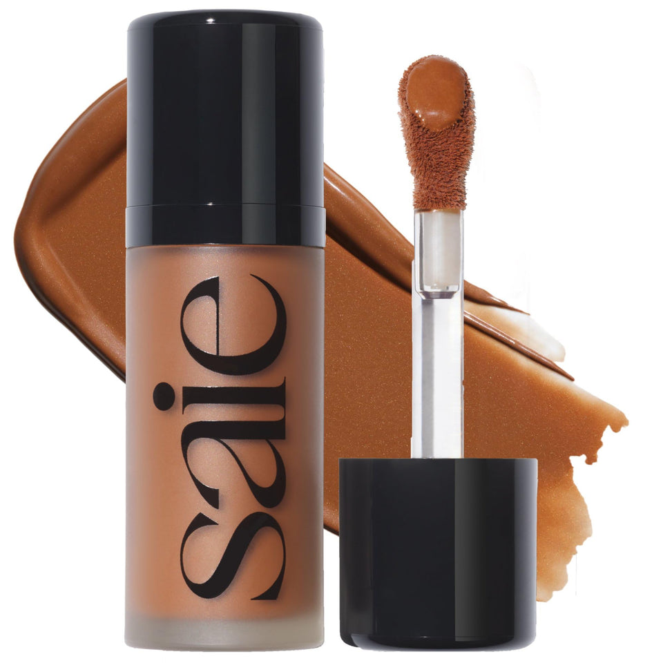 Saie Dew Bronze front packaging showing compact bronzer stick, portable and travel-friendly