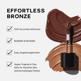 Saie Dew Bronze texture swipe on skin demonstrating blendable dewy finish and buildability