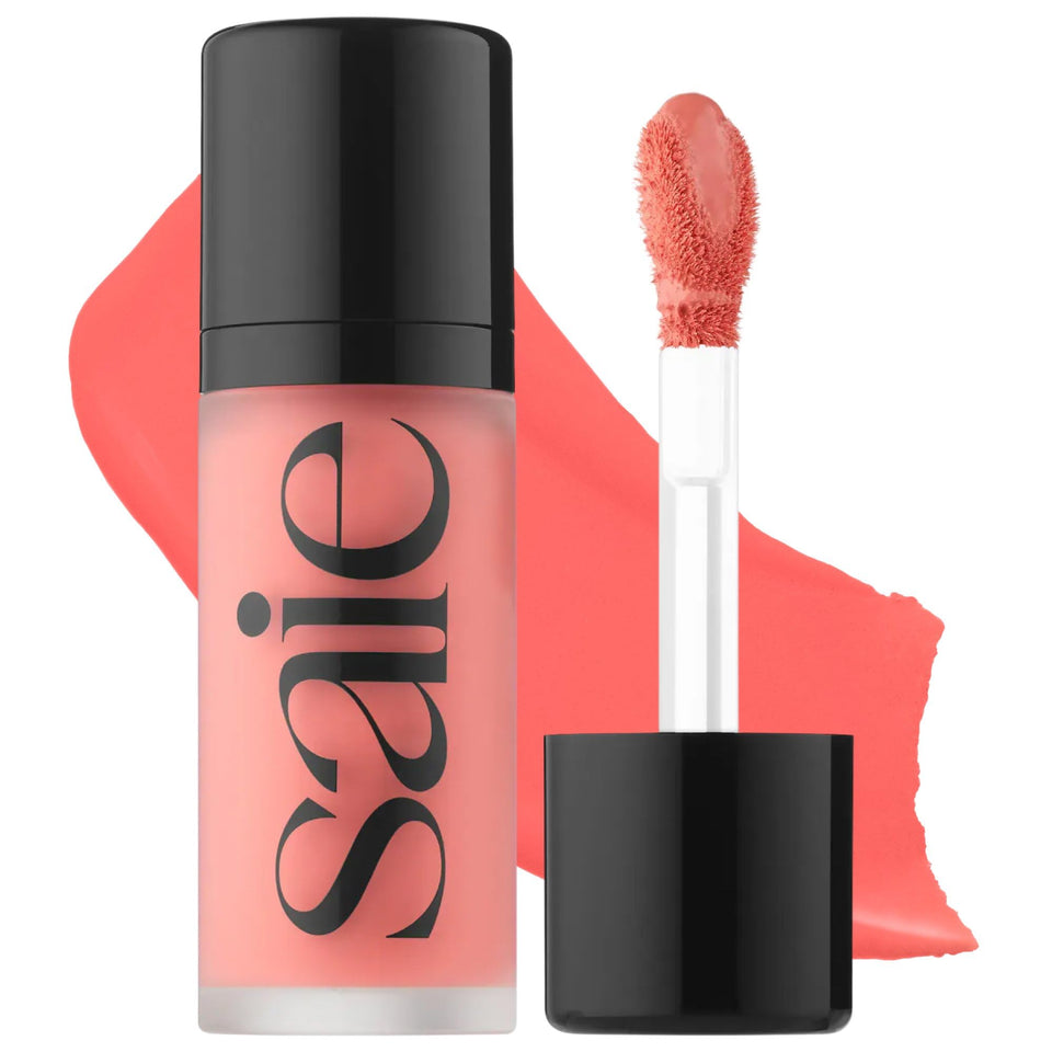 Saie Dew Liquid Blush front tube showing Poppy shade and compact design benefit