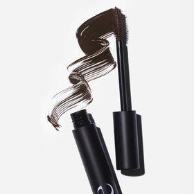 Saie mascara texture swatch on skin illustrating buildable brown pigment