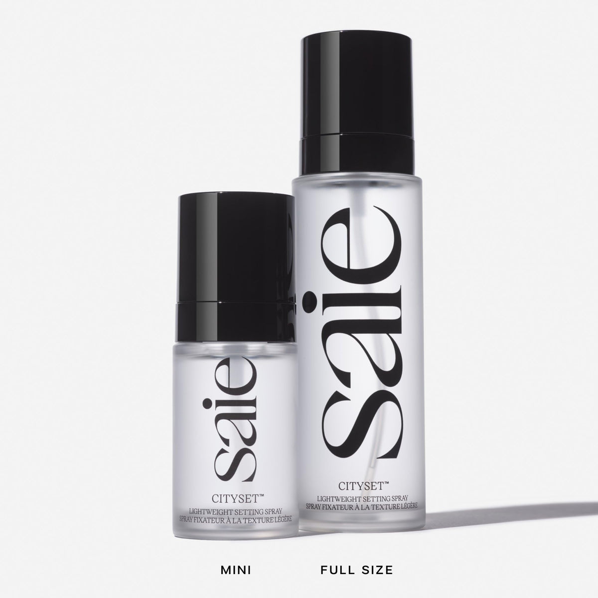 Saie mini CitySet used outdoors in sunlight showing long‑wear benefit: makeup stays fresh