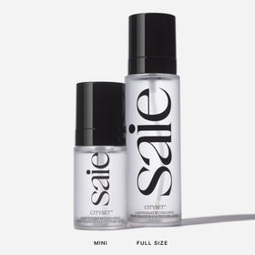 Saie mini CitySet used outdoors in sunlight showing long‑wear benefit: makeup stays fresh