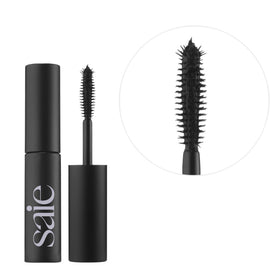 Saie mini mascara texture swipe showing smooth, buildable pigment benefit