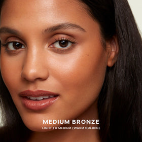 Saie open tube revealing cream-balm consistency for effortless layering