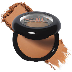 Saie compact front view showing Napoli bronzer and sleek packaging for easy travel.