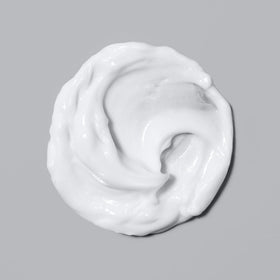 Saints & Sinners being smoothed through damp hair for heat-protection benefit