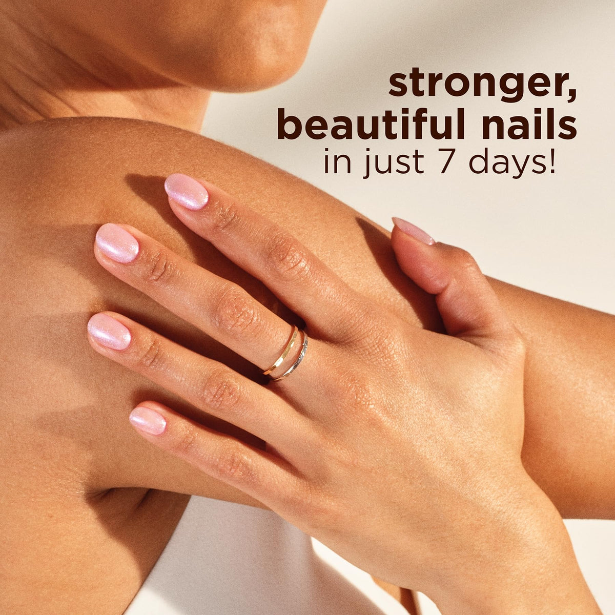 Sally Hansen polish with top coat showing added shine and strengthened nails