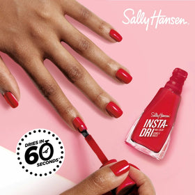 Sally Hansen swatch on hand displays opaque cocoa brown and quick-dry benefit