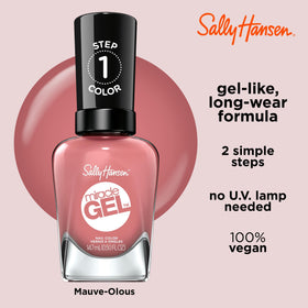 Sally Hansen top coat being applied to seal color for long-lasting, salon-like finish