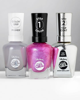 Sally Hansen nail polish in use by cozy setting offering long-lasting shine